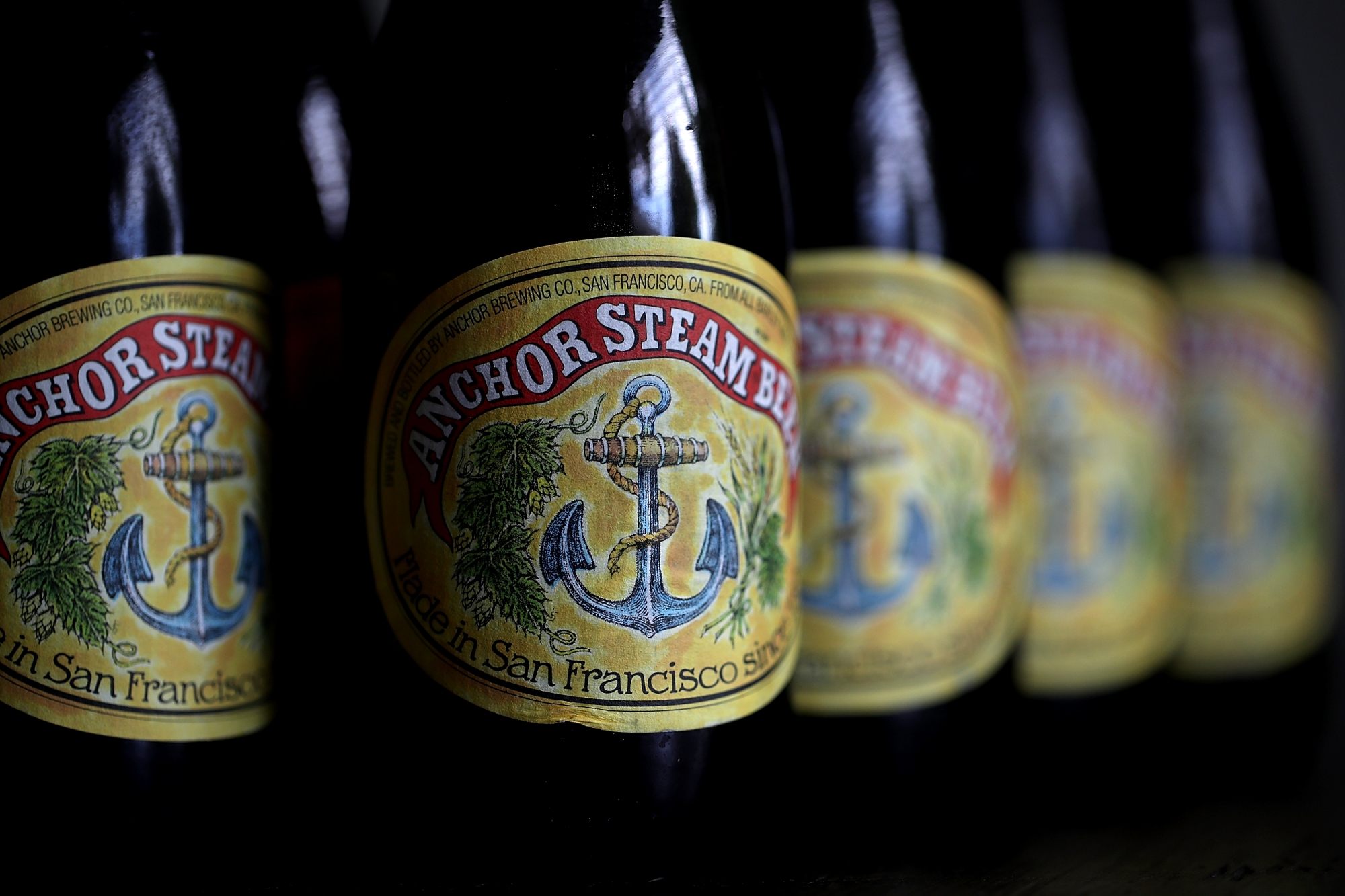 SAN ANSELMO, CA - AUGUST 03: Bottles of Anchor Steam beer are displayed on August 3, 2017 in San Anselmo, California. San Francisco based Anchor Brewing announced plans to sell to JapanÕs Sapporo Holdings Ltd for an undisclosed amount. Anchor Steam has brewed in San Francisco for 121 years. (Photo Illustration by Justin Sullivan/Getty Images)