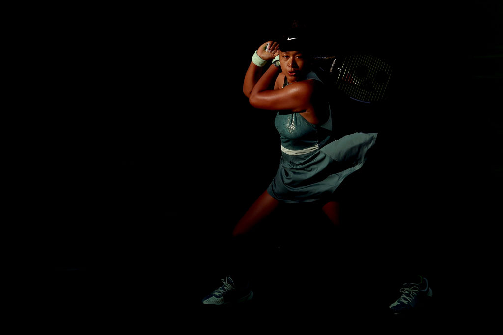 INDIAN WELLS, CALIFORNIA - MARCH 07: Naomi Osaka of Japan returns a shot to Sara Errani of Italy during the BNP Paribas Open at Indian Wells Tennis Garden on March 07, 2024 in Indian Wells, California. (Photo by Matthew Stockman/Getty Images)