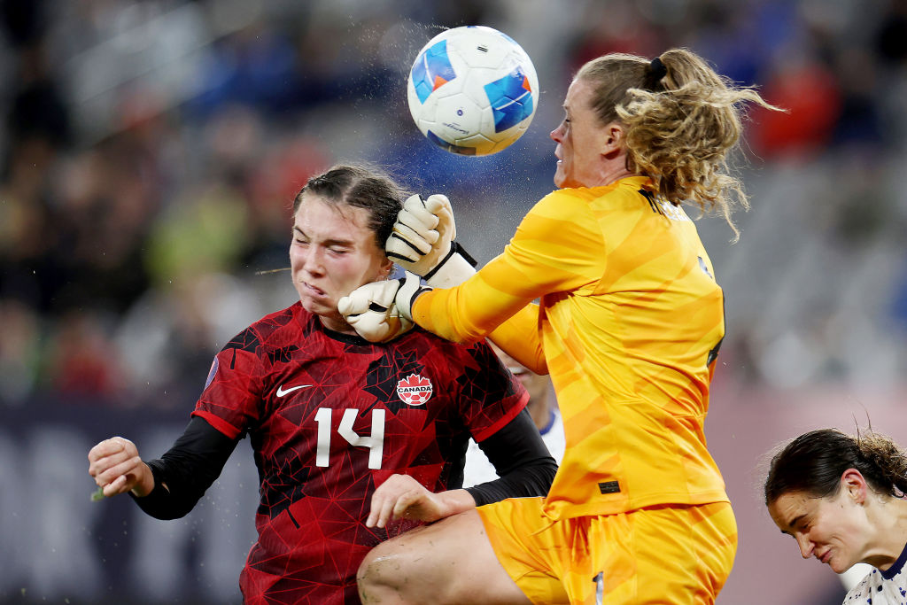 SAN DIEGO, CALIFORNIA - MARCH 06: Alyssa Naeher #1 of the United States makes a save against Vanessa Gilles #14 of Canada in extra time during the 2024 Concacaf W Gold Cup semifinals at Snapdragon Stadium on March 06, 2024 in San Diego, California. (Photo by Harry How/Getty Images)