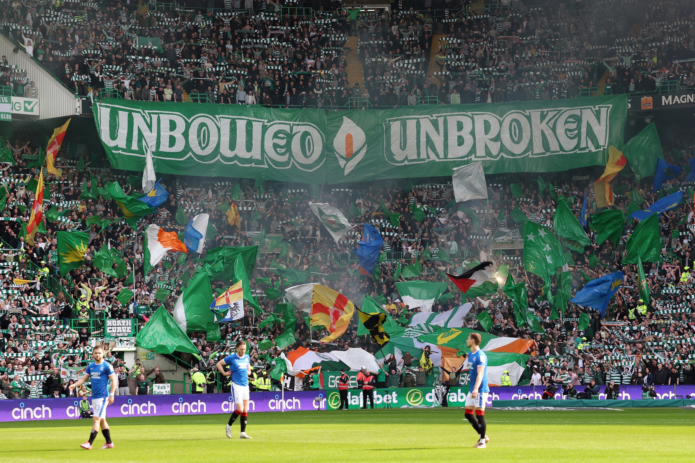 GLASGOW, SCOTLAND - APRIL 08: Celtic fans unveil a banner reading "unbowed, unbroken" during the Cinch Scottish Premiership match between Celtic FC and Rangers FC at Celtic Park on April 08, 2023 in Glasgow, Scotland. (Photo by Ian MacNicol/Getty Images)